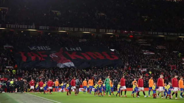 Denis Law banner at Old Trafford