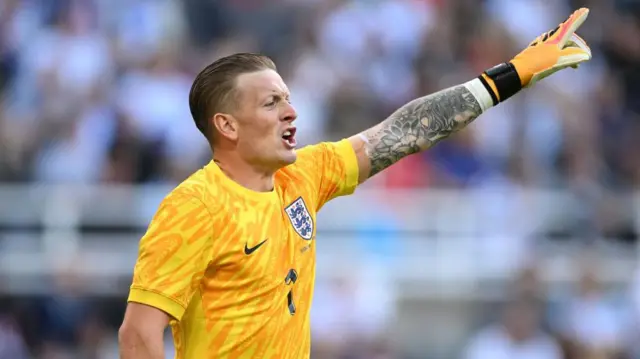 Jordan Pickford in action for England