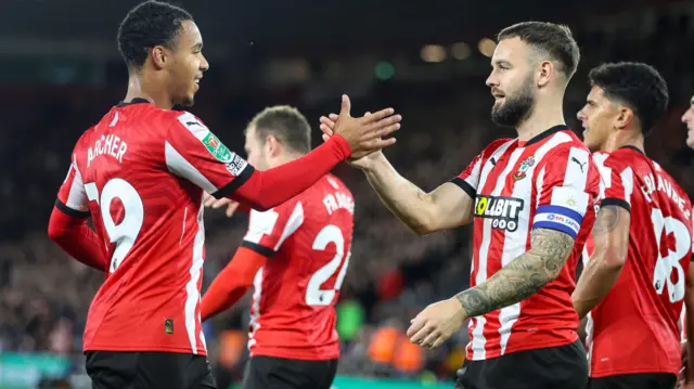 Southampton players celebrate scoring a goal