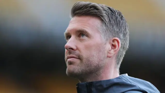 Rob Edwards looks on before a match against Wolves while managing Luton