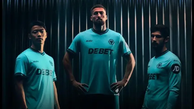 Players wearing Wolves' new 2025-26 turquoise away kit