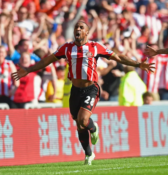 Jermain Defoe of Sunderland celebrates scoring the opening goal during the Barclays Premier League match between Sunderland and Newcastle United at Stadium of Light on April 5, 2015