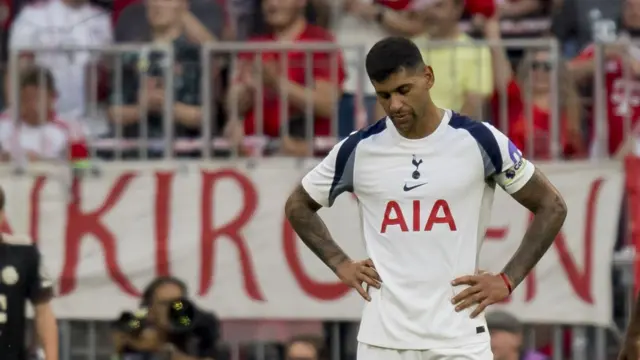 Christian Romero looks dejected with hands of hips 