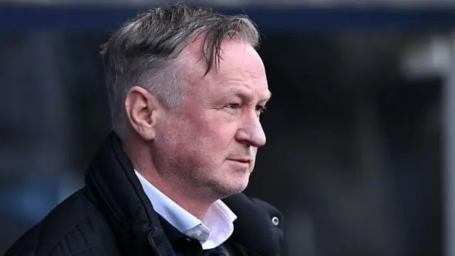 Michael O'Neill watching his Blackburn side at Millwall
