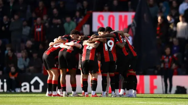 Bournemouth players in a huddle 
