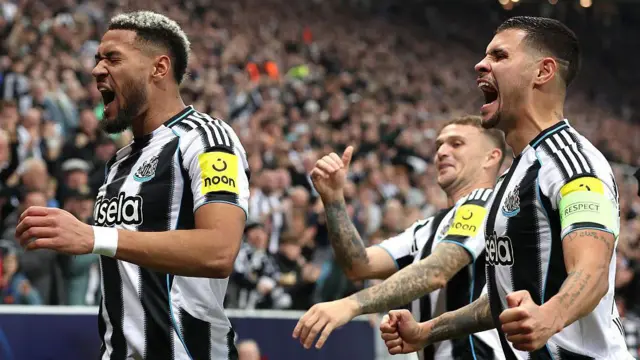 Joelinton of Newcastle United celebrates after scoring the second goal with Bruno Guimaraes and Kieran Trippier