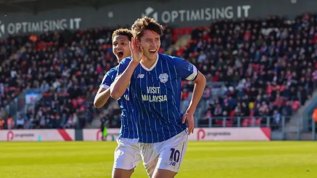 Cardiff midfielder Rubin Colwill celebrating a goal against Exeter City