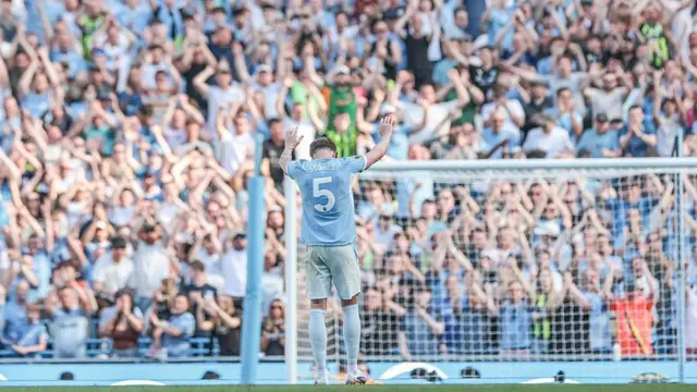 John Stones addresses the crowd