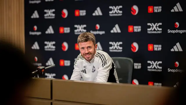 Michael Carrick of Manchester United speaks during a press conference