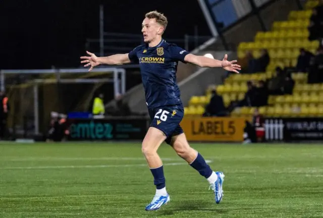 Michael Mellon celebrating his goal this afternoon, arms wide out.