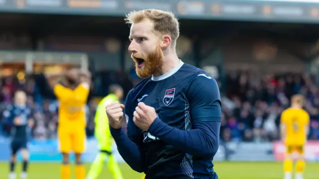 Josh Sims celebrates