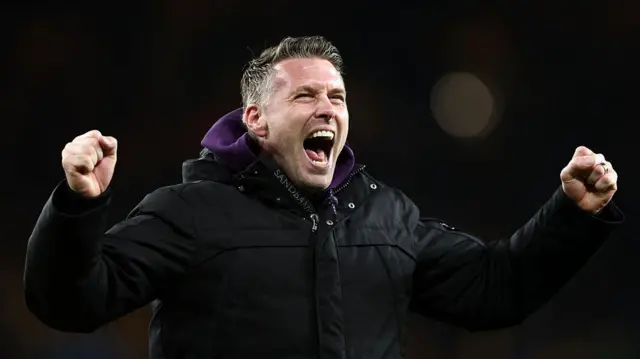 Rob Edwards celebrates win over Liverpool