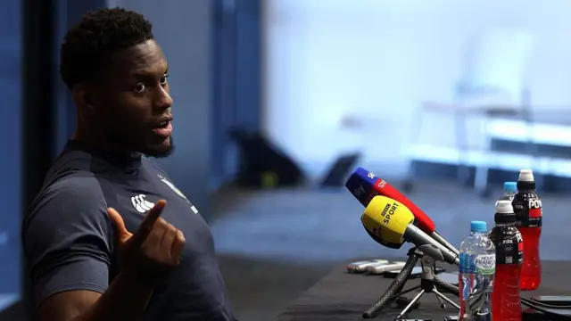 Maro Itoje talks to the media