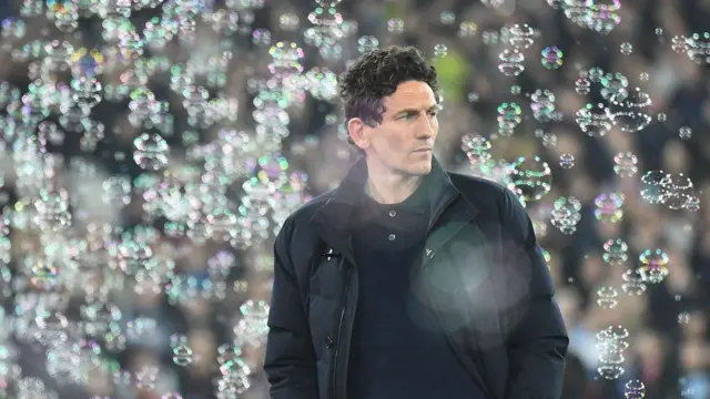 Keith Andrews surrounded by bubbles at West Ham