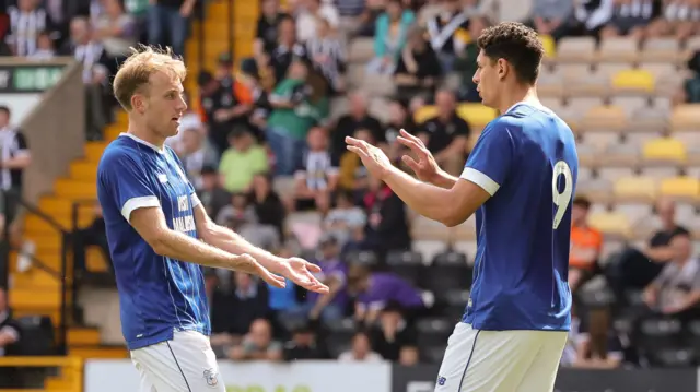 Eli King (left) celebrates with Cardiff City team-mate Yousef Salech