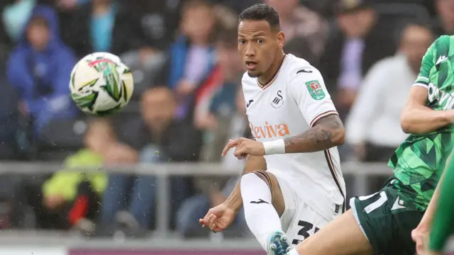 Ronald in action for Swansea City