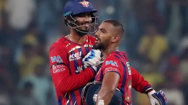 Nicholas Pooran celebrates hitting the winning runs