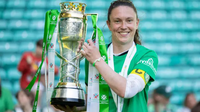 Kelly Clark with SWPL trophy