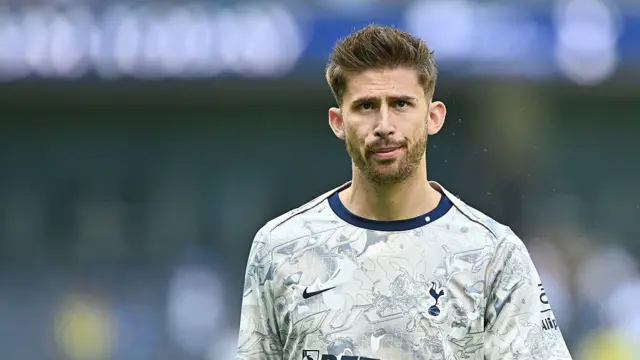 Guglielmo Vicario of Tottenham Hotspur warms up before the Premier League match between Tottenham Hotspur and Everton at Tottenham Hotspur Stadium 