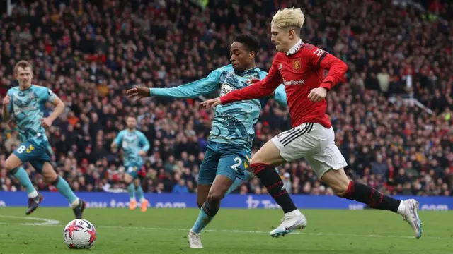 Alejandro Garnacho of Manchester United takes on Kyle Walker-Peters of Southampton