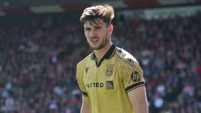 Wrexham's Ryan Longman in action
