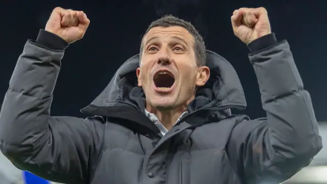 Javi Gracia punches the air with both fists to celebrate a Watford goal