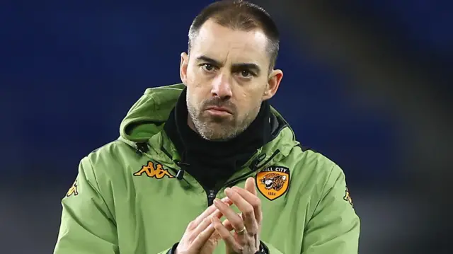 Hull City boss Ruben Selles looks disappointed as he claps the travelling supporters after the 1-0 defeat at Cardiff City