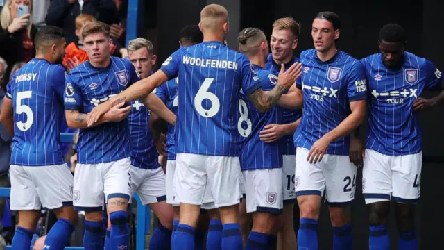 Ipswich players celebrate a goal