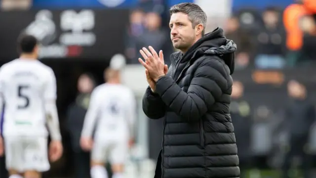 Alan Sheehan applauds after defeat by Burnley 