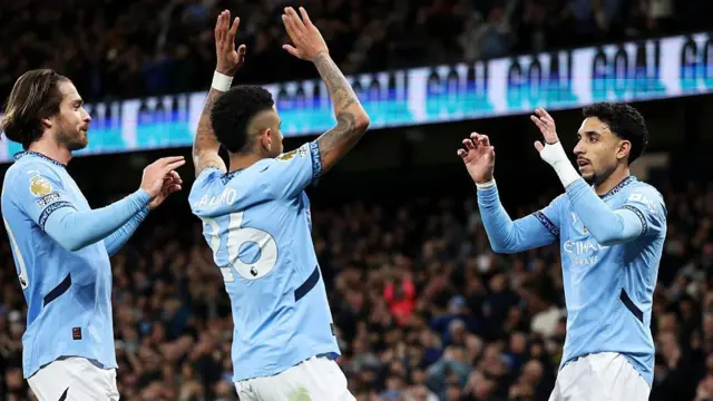 Manchester City players celebrate goal