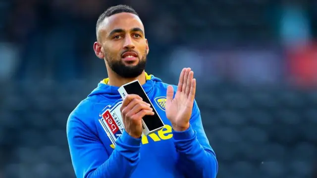 Kemar Roofe applauds during his time with Leeds United
