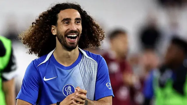 Marc Cucurella warming up for Chelsea 