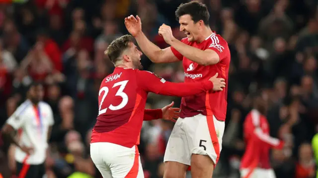 Harry Maguire and Luke Shaw celebrate