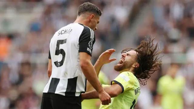 Newcastle's Fabian Schar clashing with Southampton's Ben Brereton Diaz