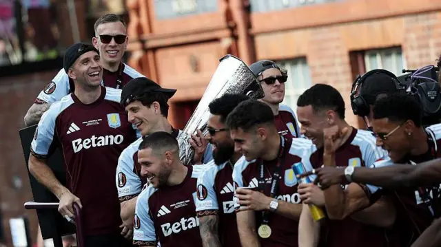  A general view as fans line the streets to greet the Aston Villa team bus