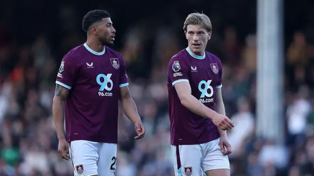 Josh Laurent of Burnley speaks to Zian Flemming