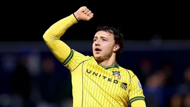 Ollie Rathbone of Wrexham punches the air