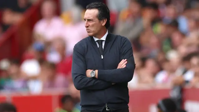 Aston Villa boss Unai Emery with a pensive look on the touchline against Brentford