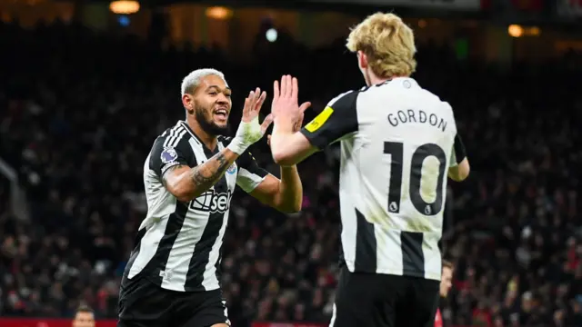 Joelinton celebrates goal with Anthony Gordon