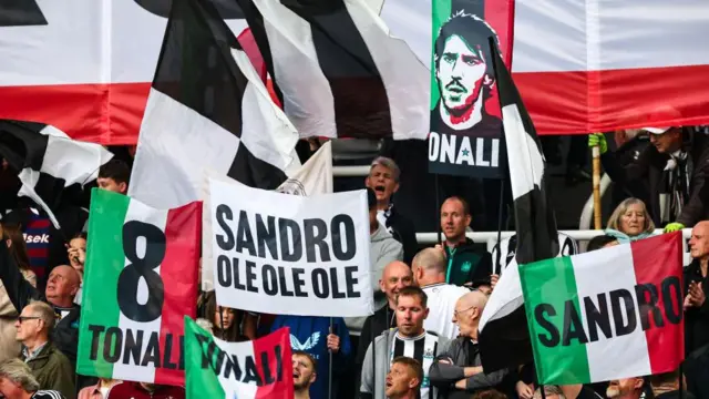 Flags paying tribute to Sandro Tonali