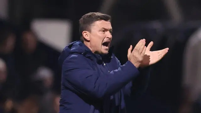 Paul Heckingbottom applauding his Preston North End team