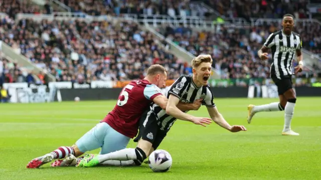 Vladimir Coufal of West Ham United fouls Anthony Gordon of Newcastle United to give away a penalty