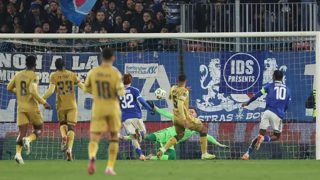 Emanuel Emegha of Strasbourg scores a goal