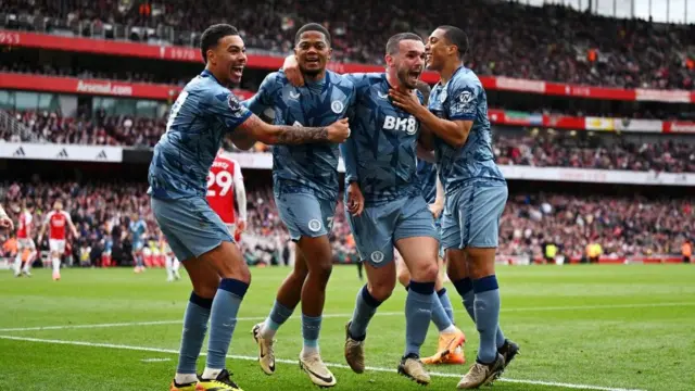 Aston Villa players celebrate