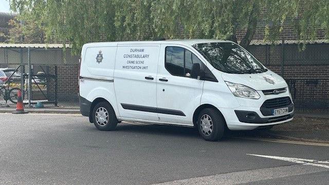 A white Durham Constabulary crime scene investigation unit van parked at Frankland Prison