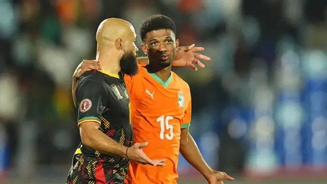 Amad Diallo (right) scored for Ivory Coast in their 1-1 draw with Bryan Mbeumo's Cameroon at the Africa Cup of Nations