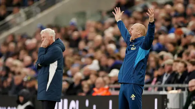 Sean Dyche throws his hands in the air