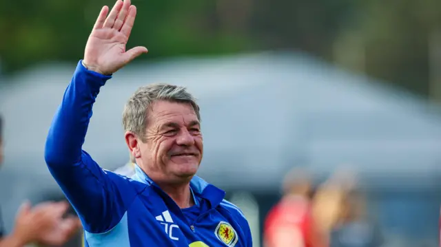 Scotland assistant John Carver ways goodbye