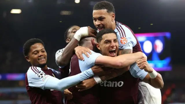 Aston Villa players celebrate goal