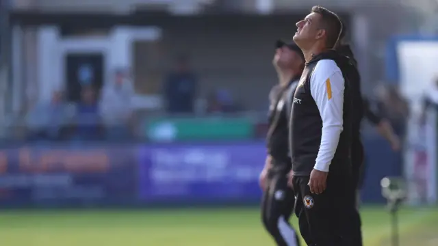 Newport County manager Nelson Jardim looks to the skies from the touchline at Barrow